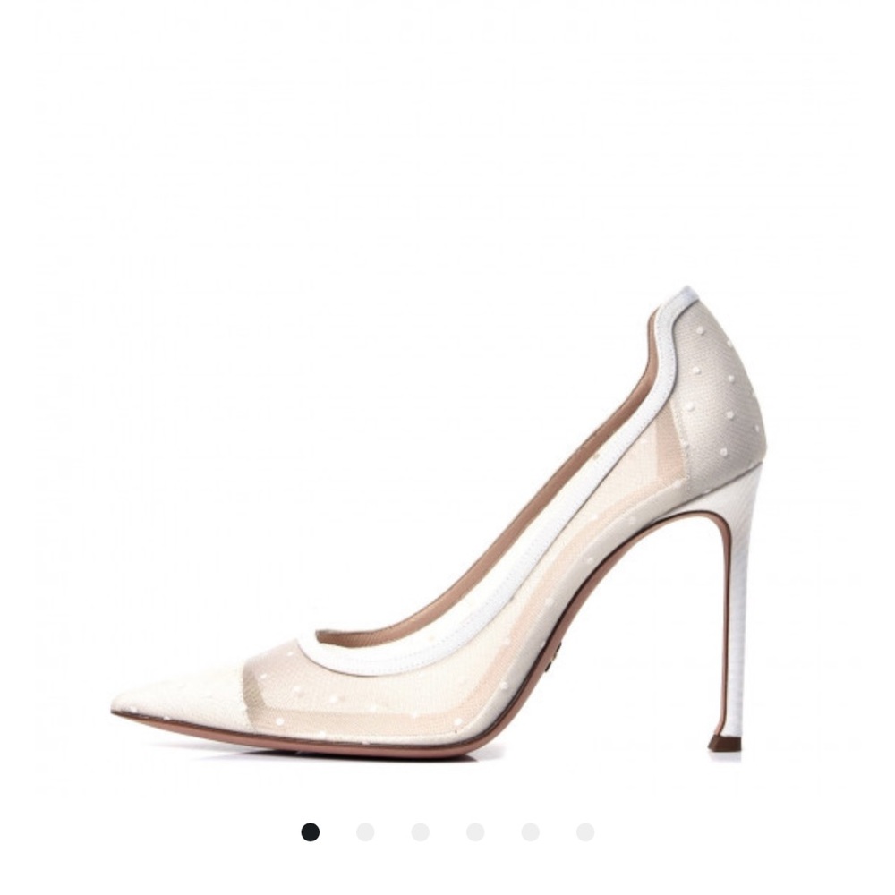 Christian Dior white mesh pumps.